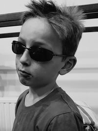Close-up portrait of boy wearing sunglasses