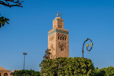 Low angle view of building against blue sky