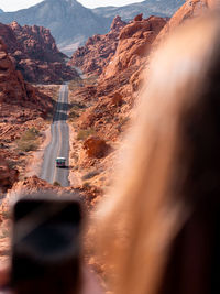 High angle view of car on road passing through desert