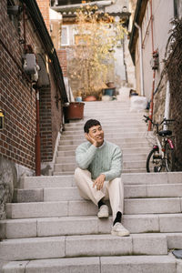 Man sitting on staircase