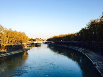 Bridge over river against clear sky