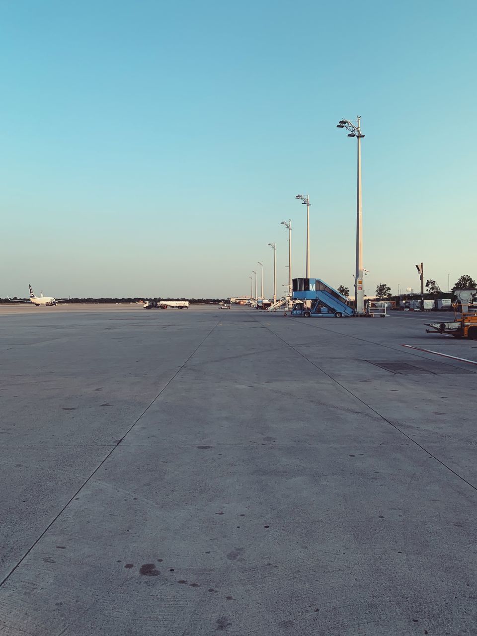 SURFACE LEVEL OF AIRPORT RUNWAY AGAINST SKY