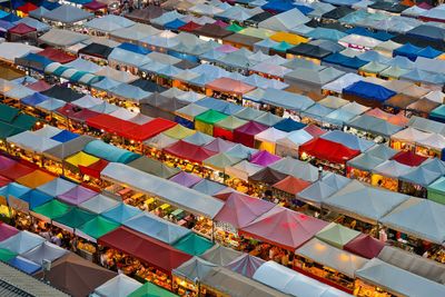 High angle view of multi colored tents at market