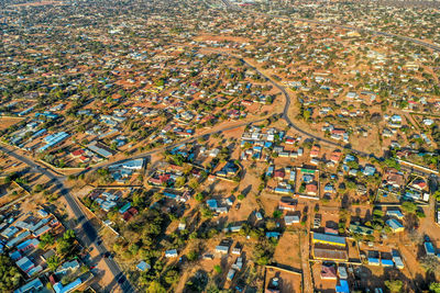 High angle view of street amidst buildings in city