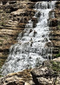 Scenic view of waterfall in forest