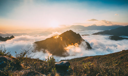 Scenic view of mountains against sky during sunset