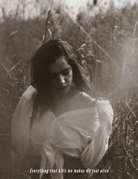 Woman looking away in forest