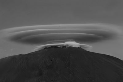 View of volcanic landscape against sky