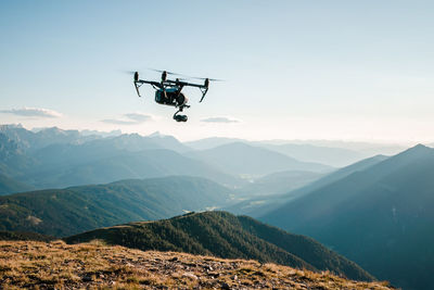 Drone flying over mountain