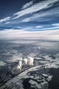 Aerial view of landscape against sky during winter