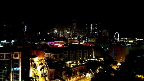 Illuminated cityscape at night