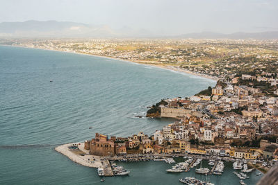 High angle view of town by sea