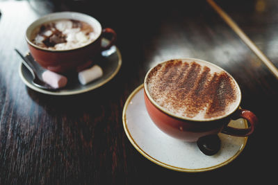 Close-up of cappuccino on table