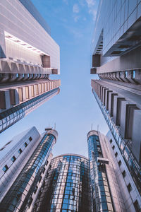 Low angle view of modern buildings against sky