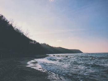 Scenic view of beach against sky