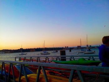 Scenic view of sea against clear sky during sunset