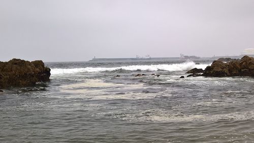 Scenic view of sea against clear sky