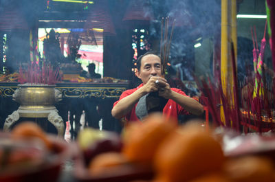 Man praying at temple