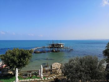 Scenic view of sea against blue sky