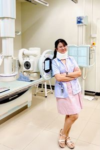 Portrait of smiling nurse at clinic