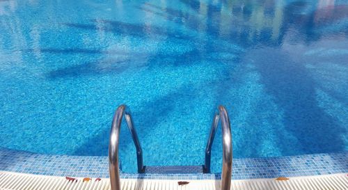 High angle view of railing at poolside