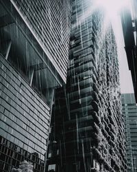 Low angle view of modern buildings against sky