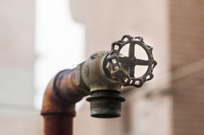 Close-up of old rusty faucet