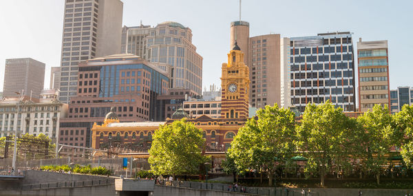 Buildings in city against sky