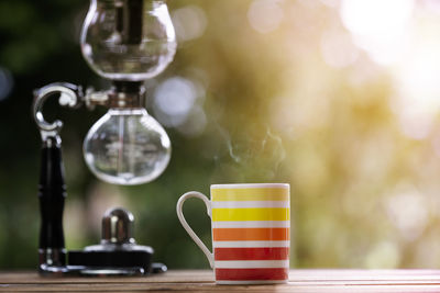 Close-up of coffee cup on table