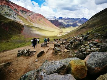 Scenic view of mountain against cloudy sky