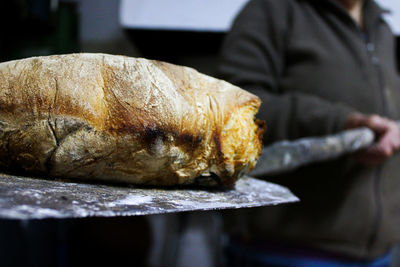 Close-up of person preparing food