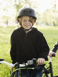 Boy cycling in park