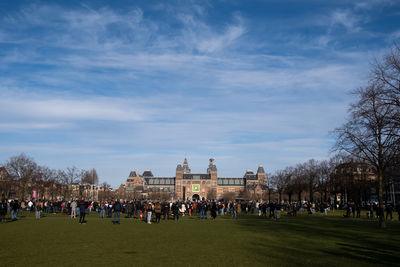 Group of people in front of historical building