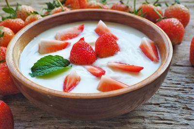 Close-up of strawberries in bowl on table