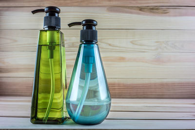 Close-up of glass bottle on table