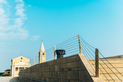 Low angle view of building against blue sky