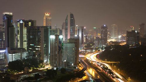 Illuminated cityscape seen from petronas towers at night