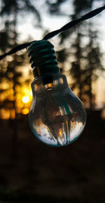 Close-up of illuminated light bulb