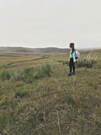 Full length of man on field against sky