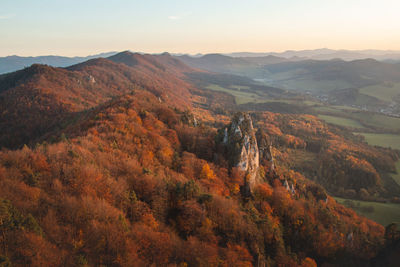 Sunset over autumn colourful forests surrounding sulovske rocks in slovakia, eastern europe