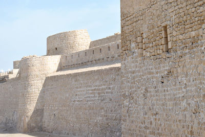 Low angle view of historical building against sky