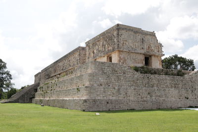 Old ruin building against cloudy sky