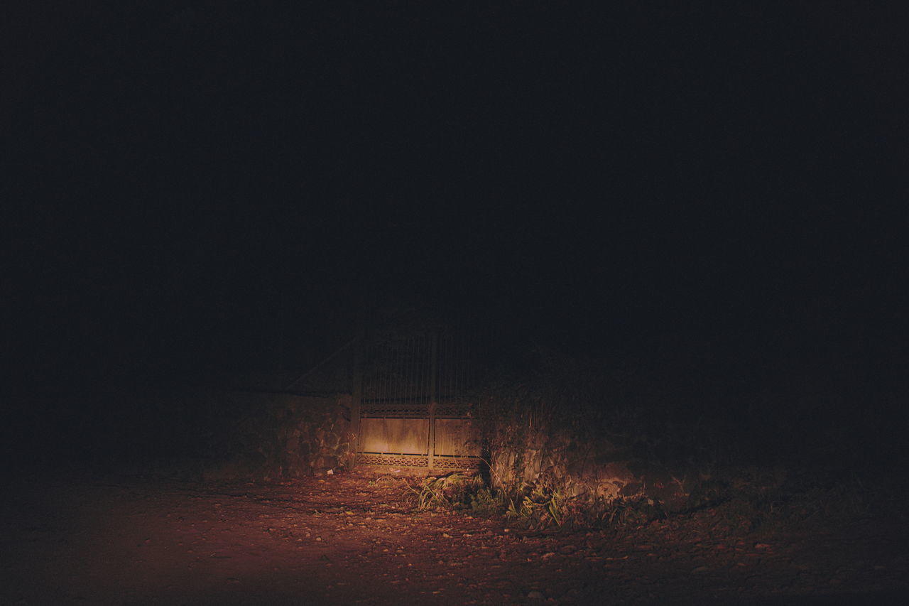 VIEW OF ABANDONED BUILDING ON FIELD