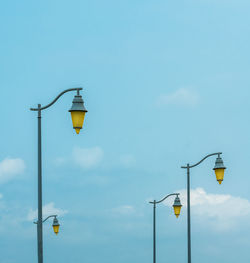 Low angle view of street light against sky