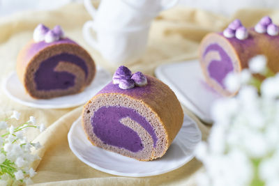 Close-up of cake served on table