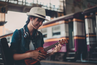 Young man playing guitar