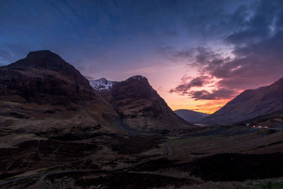 Scenic view of mountains against sky during sunset