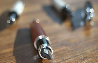 Close-up of fountain pen on table