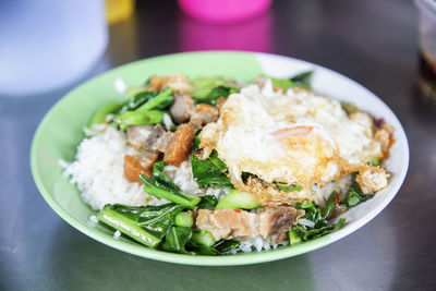 Close-up of food in plate on table