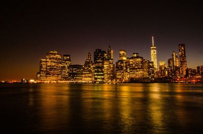 Illuminated city lit up at night